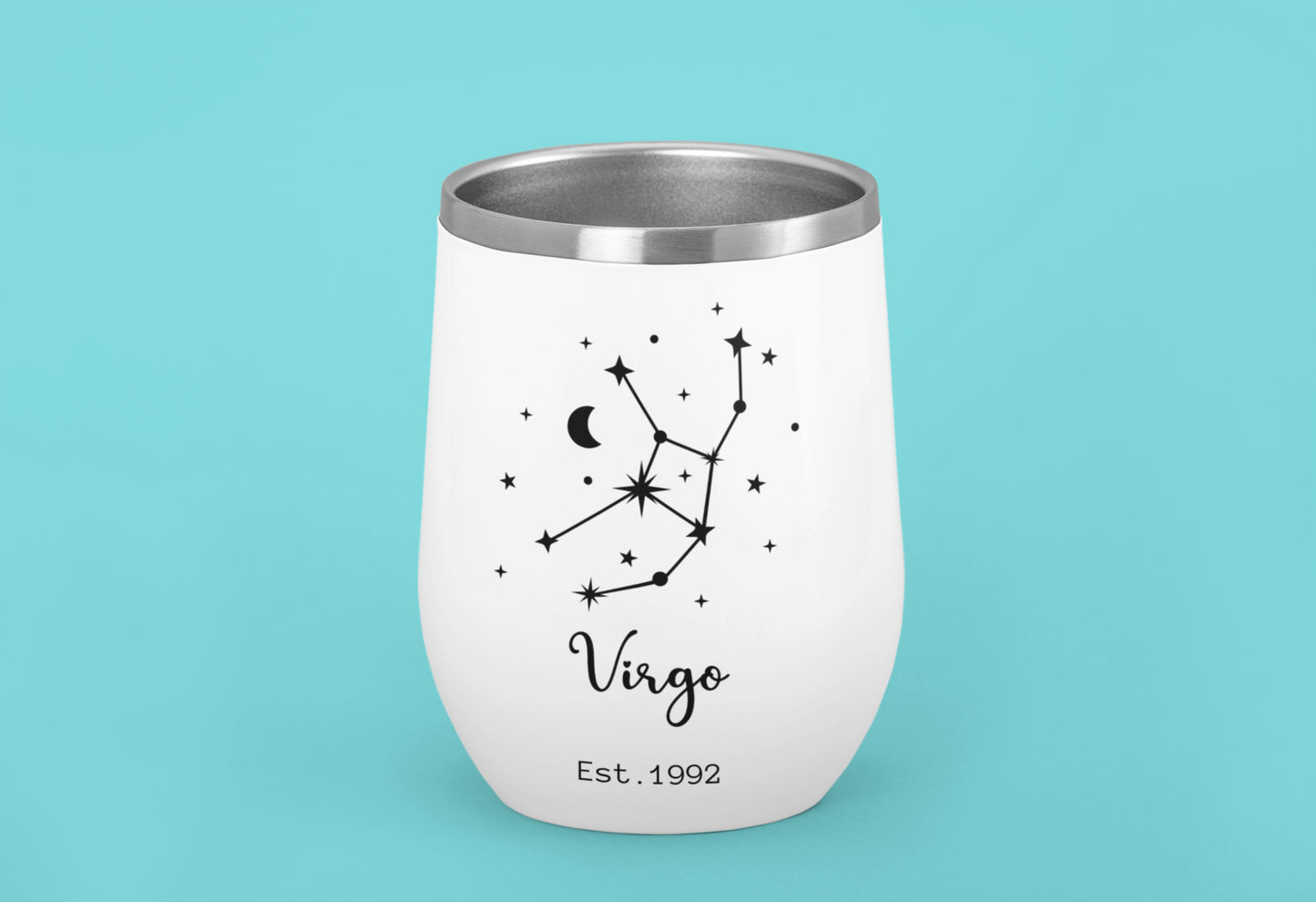 White tumbler with Virgo zodiac design on a teal background