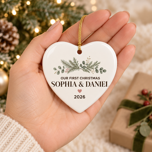 3.21 inch personalized heart ceramic ornament shown at realistic scale in an adult hand
