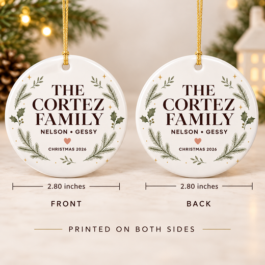 2.80 inch round family Christmas ornament shown at realistic scale in an adult hand