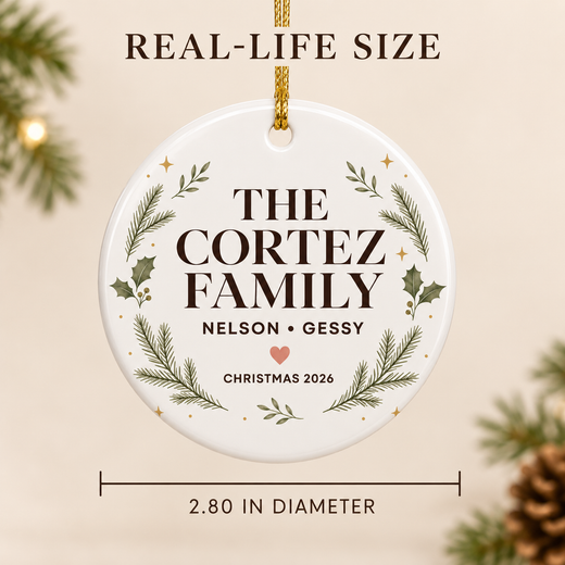 Personalized round family ornament hanging on a Christmas tree